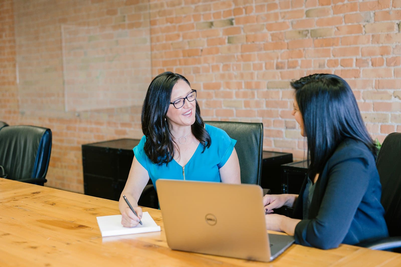Two colleagues in a meeting